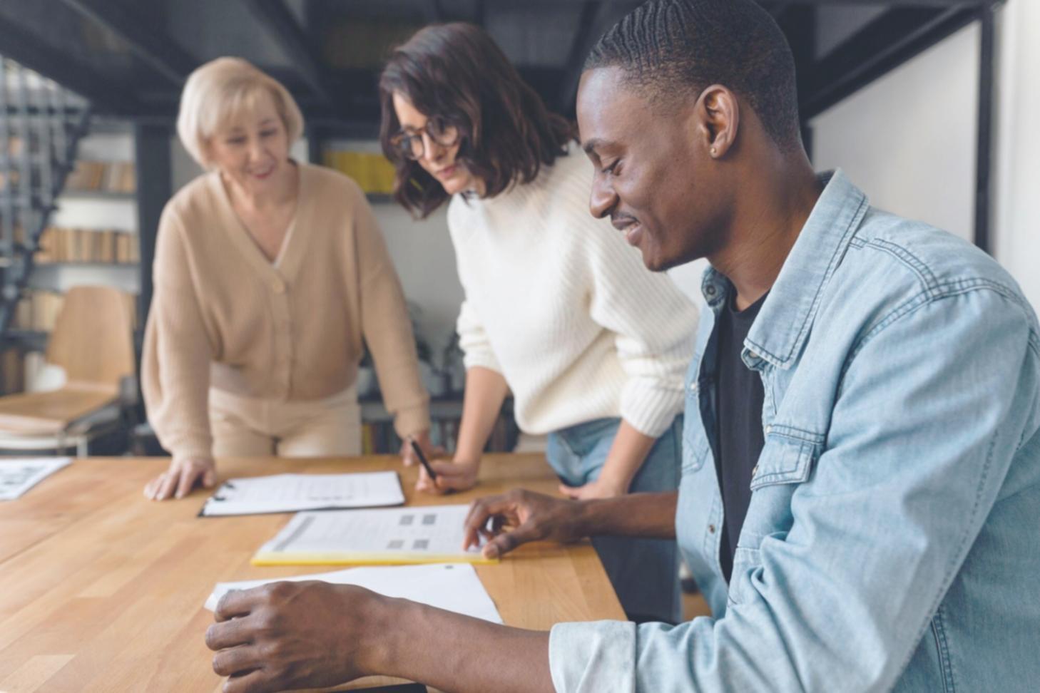 Team working with real business owners on financial strategies